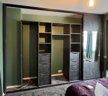 Charcoal flow wardrobe interior with hanging, drawers and shelves, installed in Acklam